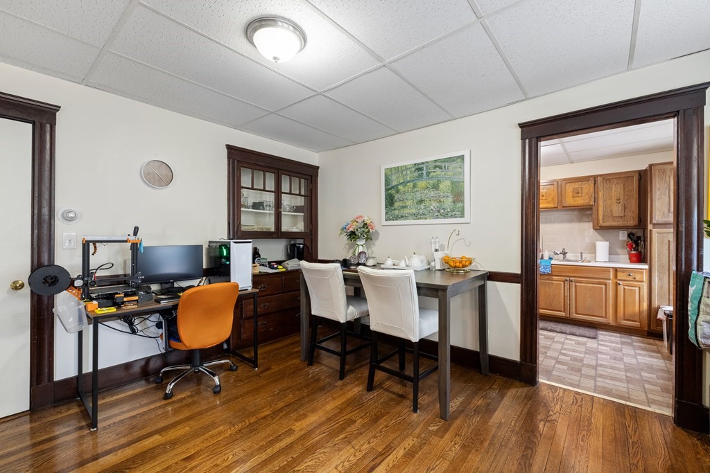 382 McGrath Highway Somerville, MA 02143 - Photo 10 of 31 a view of a dining room with furniture window and wooden floor