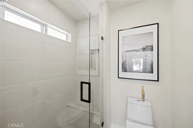 a view of a chairs and table in a balcony