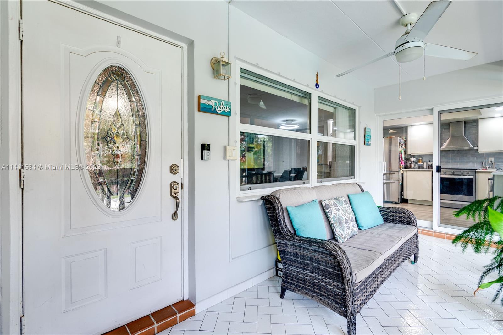 200 Northeast 12th Avenue, Unit 5B Hallandale Beach, FL 33009 - Photo 18 of 26 a living room with furniture and wooden floor
