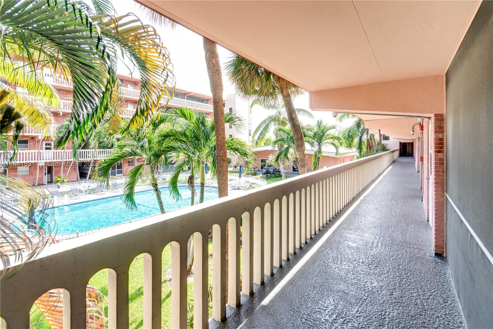 200 Northeast 12th Avenue, Unit 5B Hallandale Beach, FL 33009 - Photo 20 of 26 a view of balcony with wooden floor