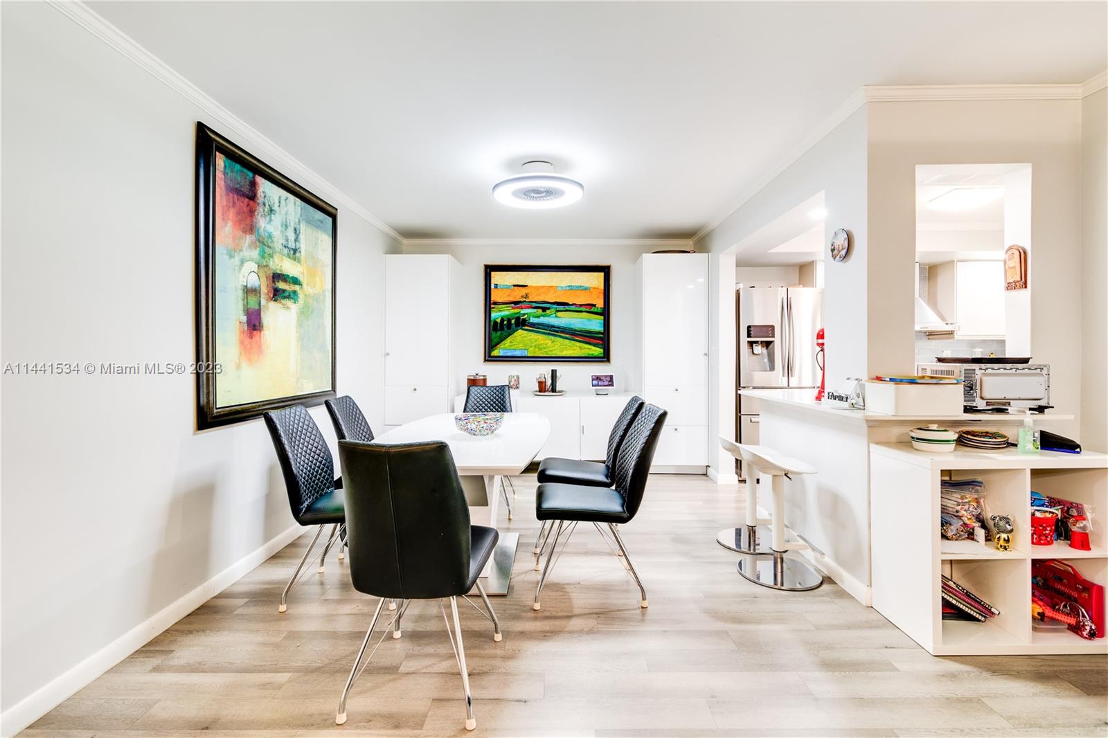 200 Northeast 12th Avenue, Unit 5B Hallandale Beach, FL 33009 - Photo 6 of 26 a view of a dining room with furniture