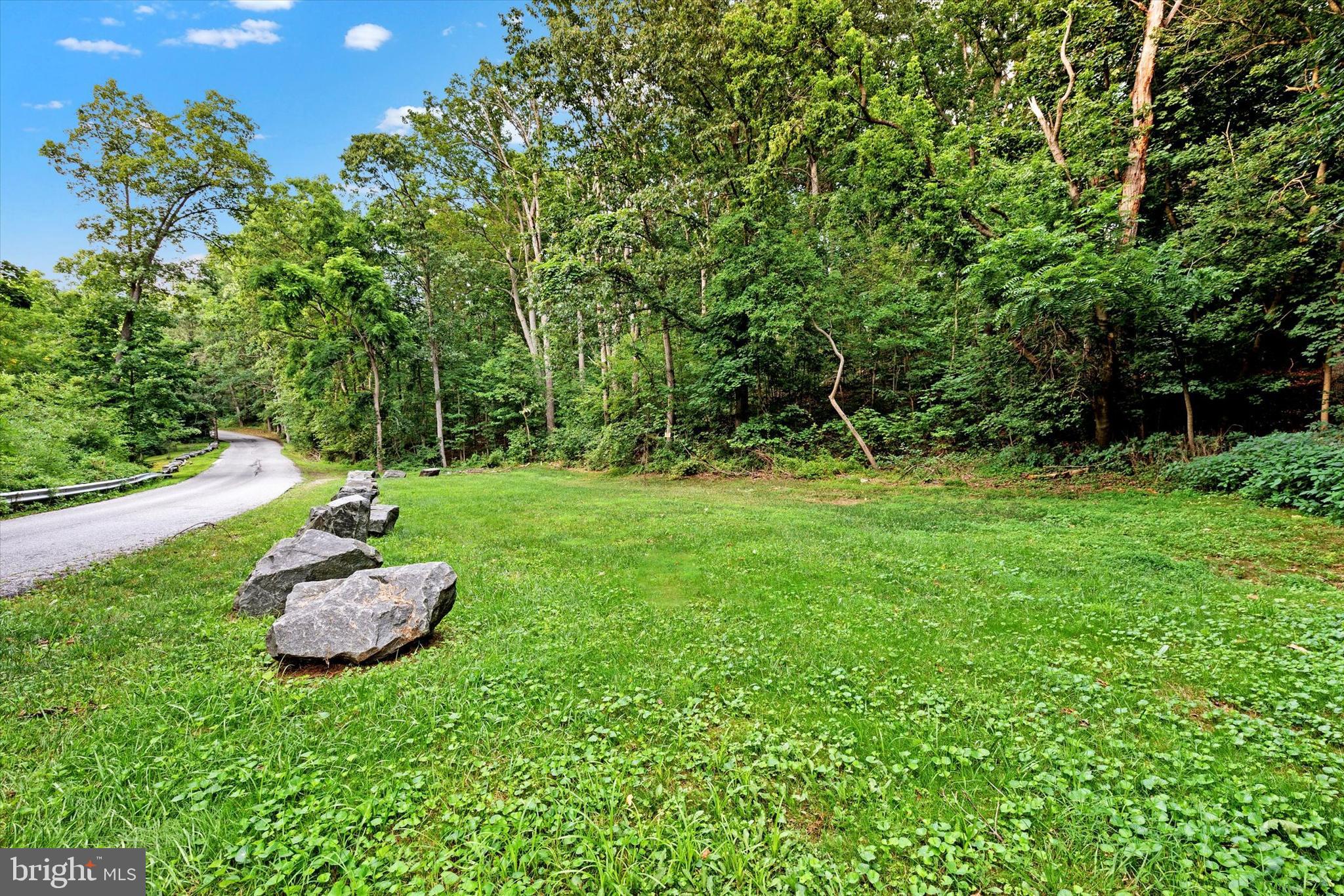 606 Freeland Road Freeland, MD 21053 - Photo 23 of 50 a backyard of a house with lots of green space