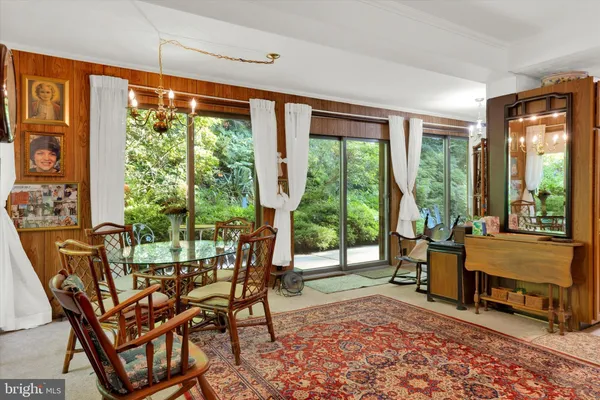 a living room with furniture or couch and a window
