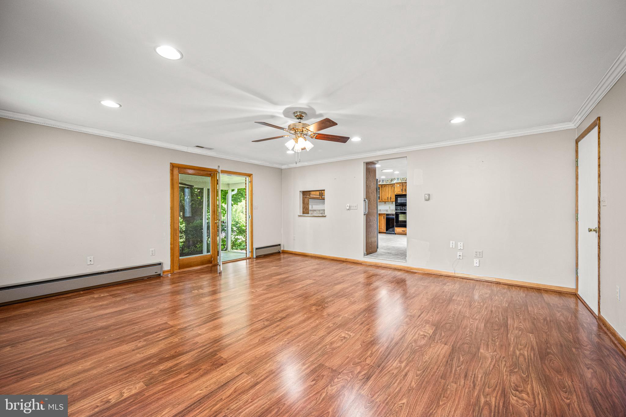 2108 Woodview Road Finksburg, MD 21048 - Photo 21 of 52 Family room with entrance to screened in porch