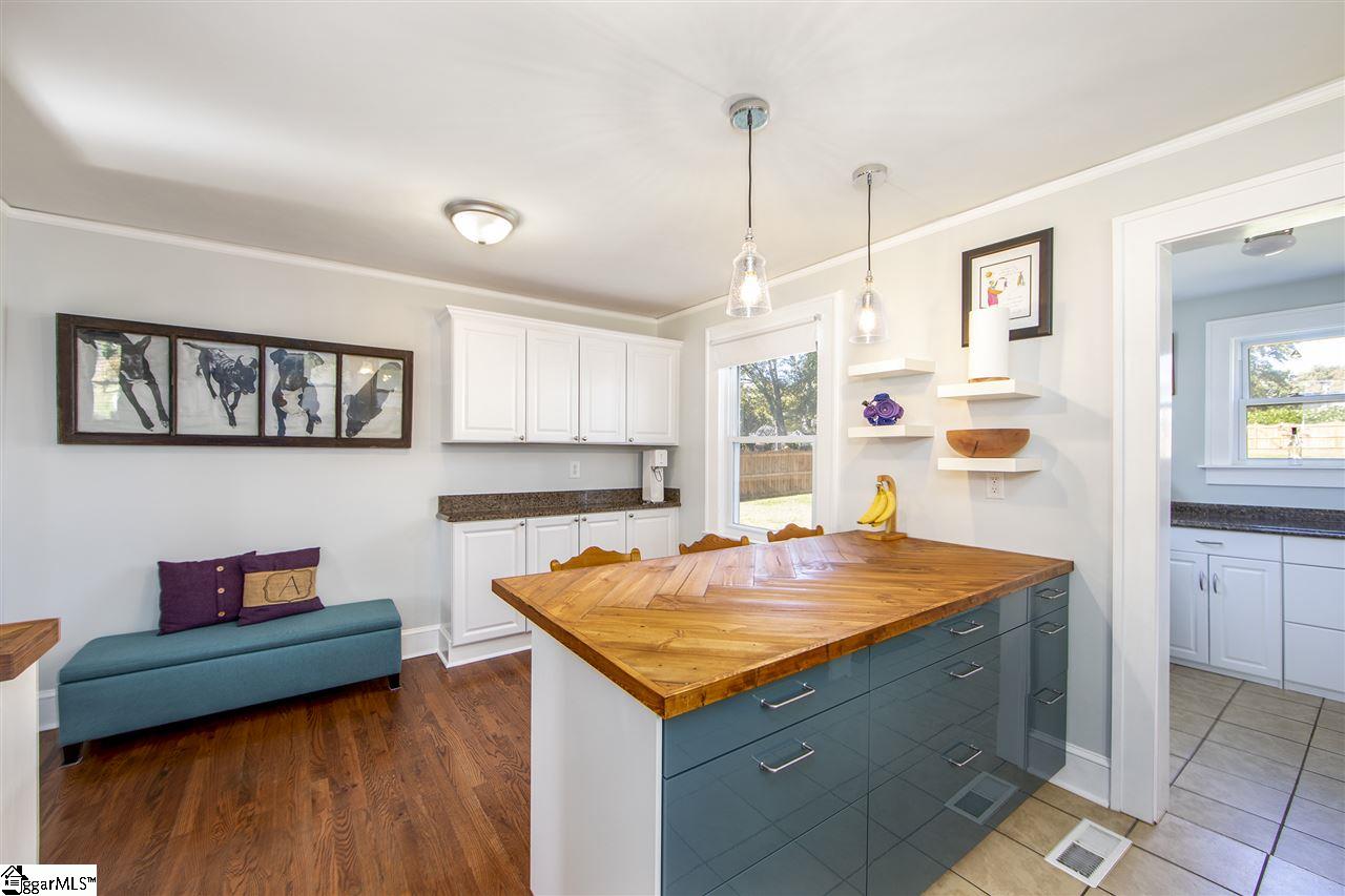 34 Ackley Road Greenville, SC 29607 - Photo 12 of 27 Once two Rooms now Open with custom sidebar.