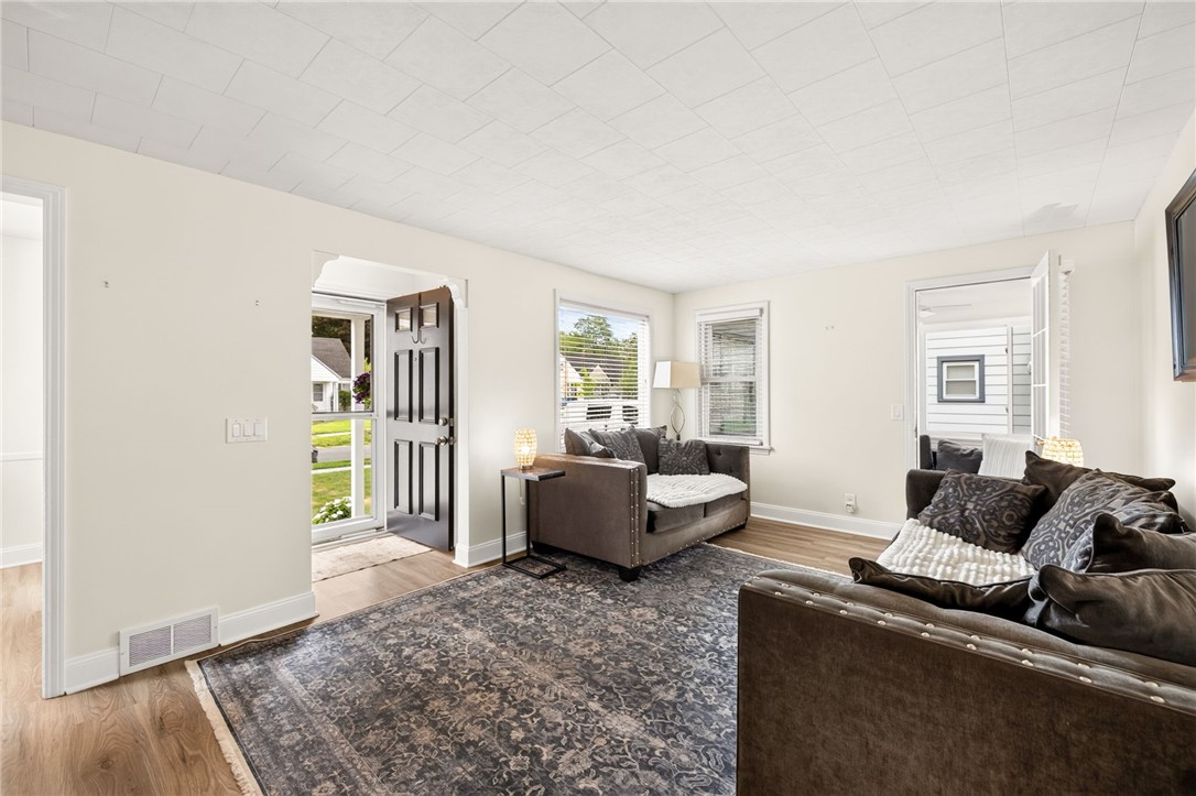 138 Glenthorne Road Rochester, NY 14615 - Photo 4 of 30 Step into the light filled living room.