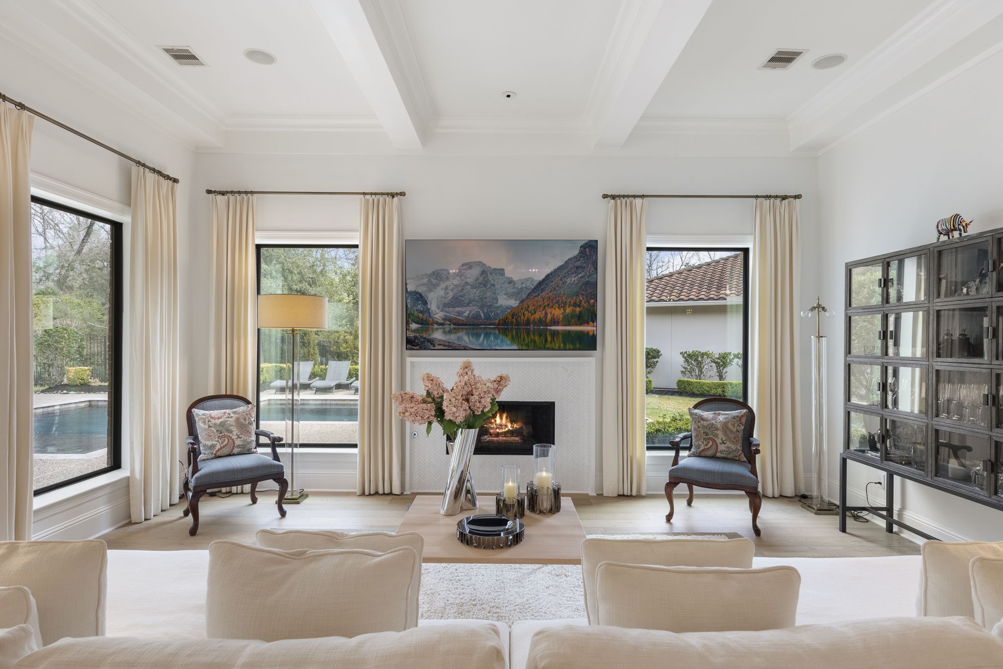 70 Lake Reverie Place Tomball, TX 77375 - Photo 11 of 33 a living room with furniture and a floor to ceiling window