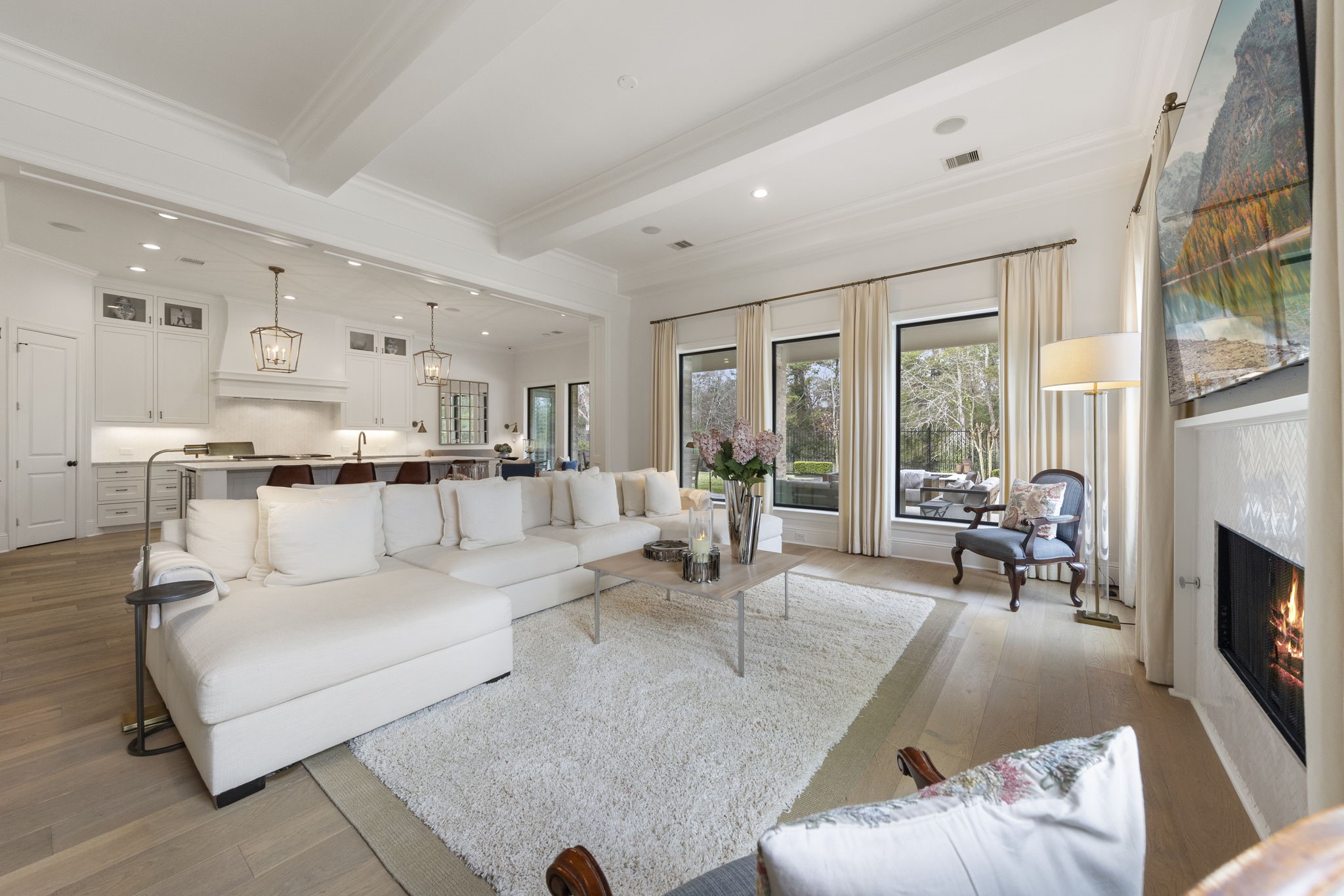 70 Lake Reverie Place Tomball, TX 77375 - Photo 13 of 33 a living room with furniture and a fireplace
