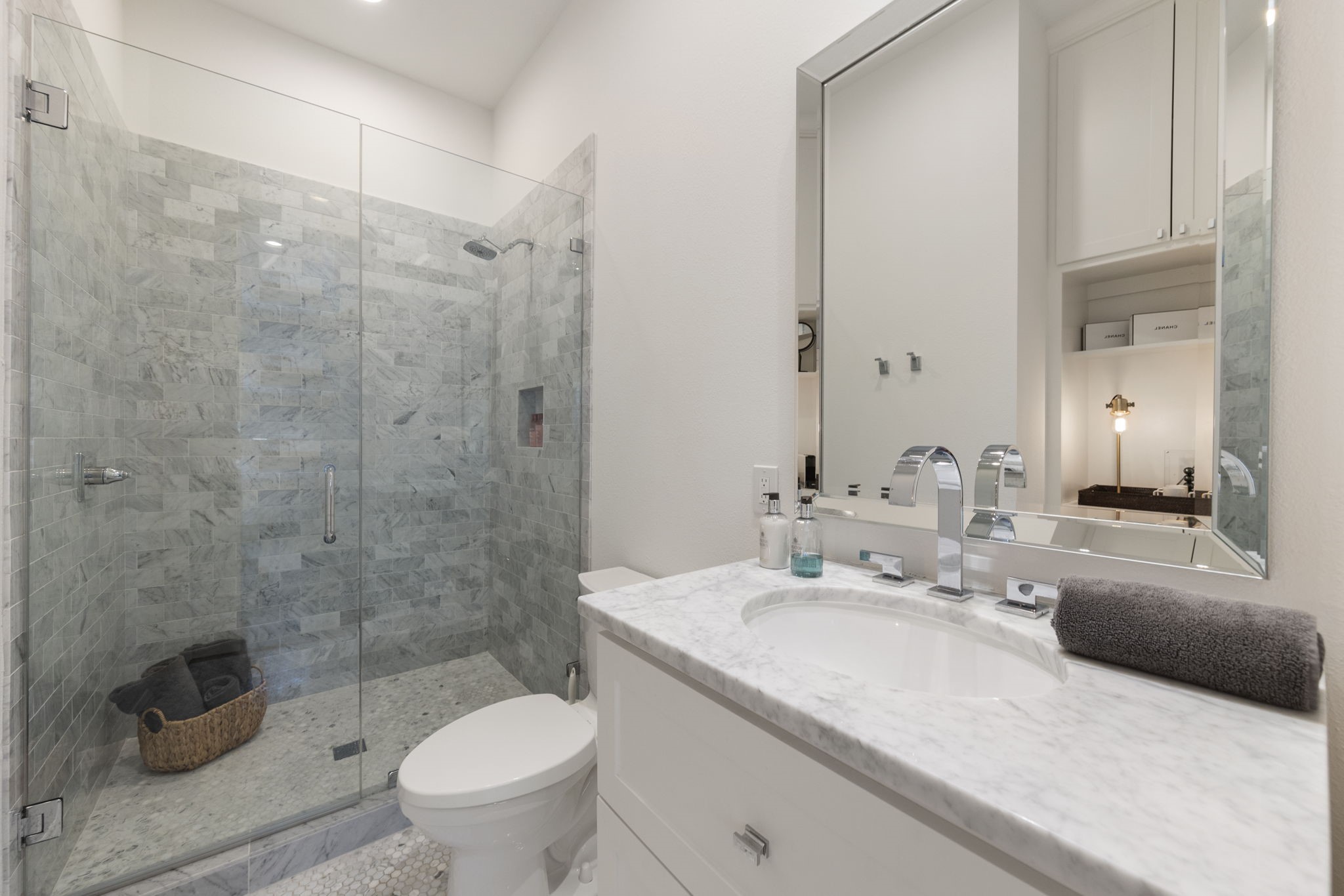 70 Lake Reverie Place Tomball, TX 77375 - Photo 21 of 33 a bathroom with a granite countertop sink a toilet and shower