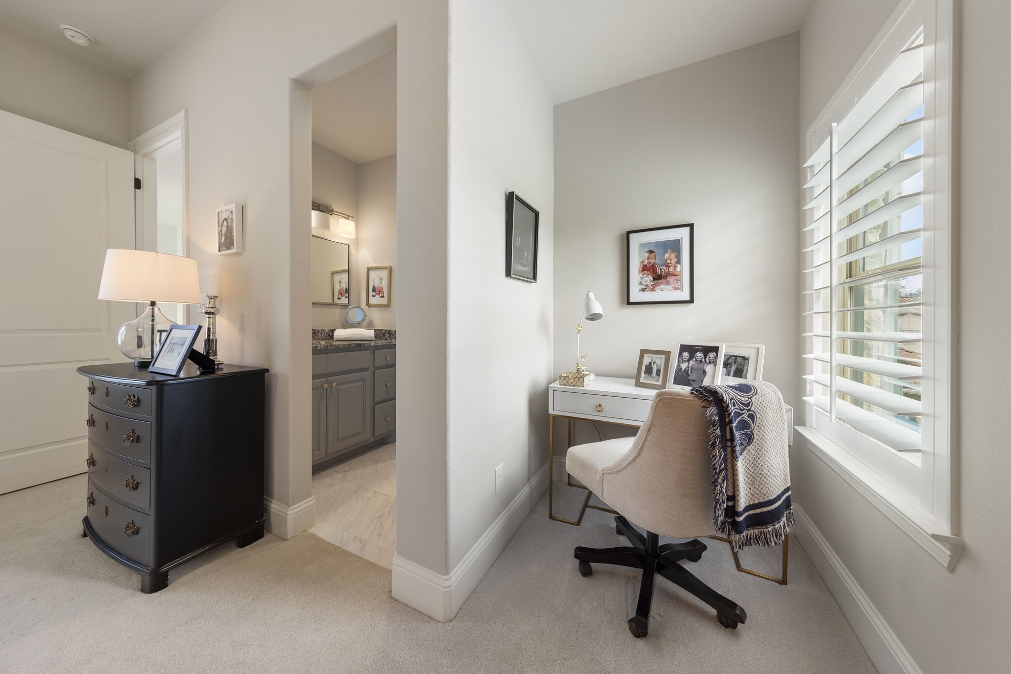 70 Lake Reverie Place Tomball, TX 77375 - Photo 25 of 33 a view of a workspace with furniture and a window