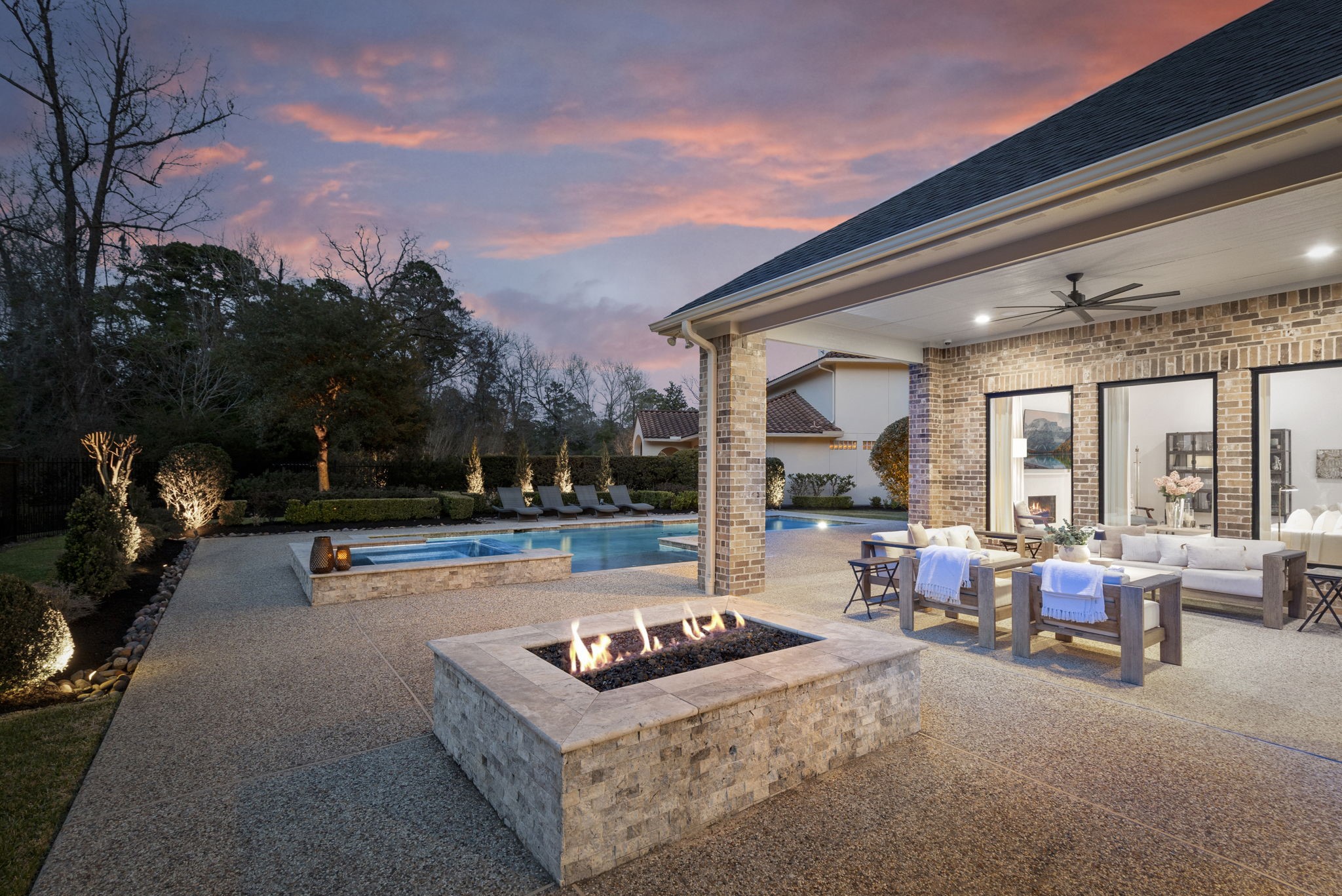 70 Lake Reverie Place Tomball, TX 77375 - Photo 29 of 33 a view of a patio with swimming pool table and chairs