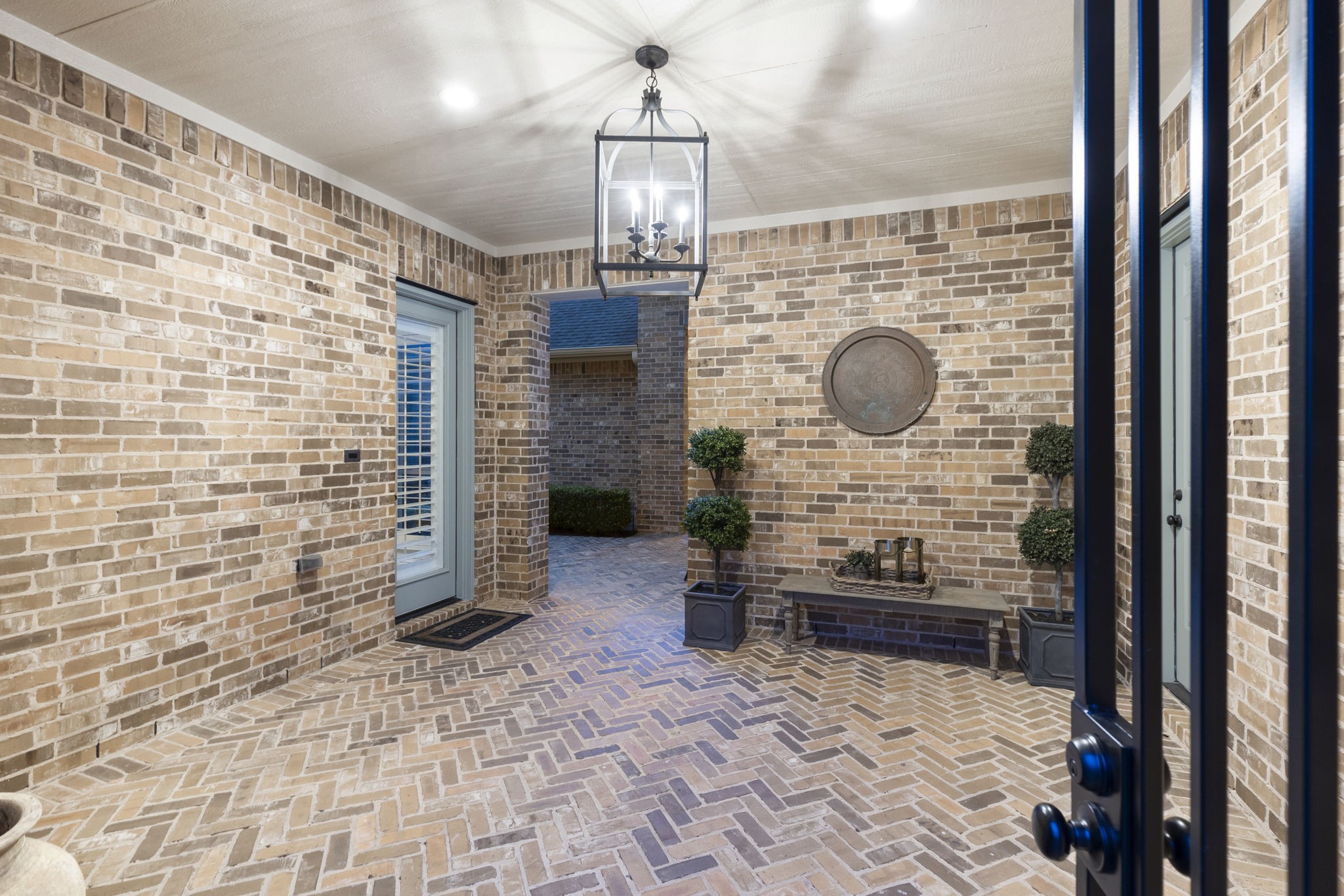 70 Lake Reverie Place Tomball, TX 77375 - Photo 3 of 33 a bathroom with a sink and a mirror