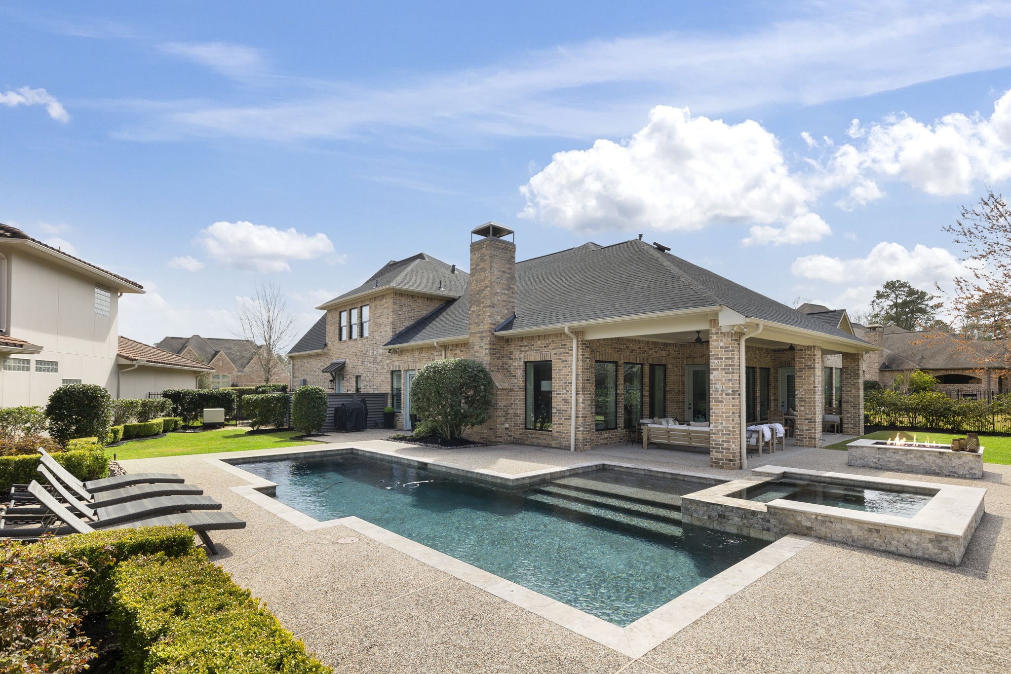 70 Lake Reverie Place Tomball, TX 77375 - Photo 33 of 33 a view of a house with swimming pool and a yard