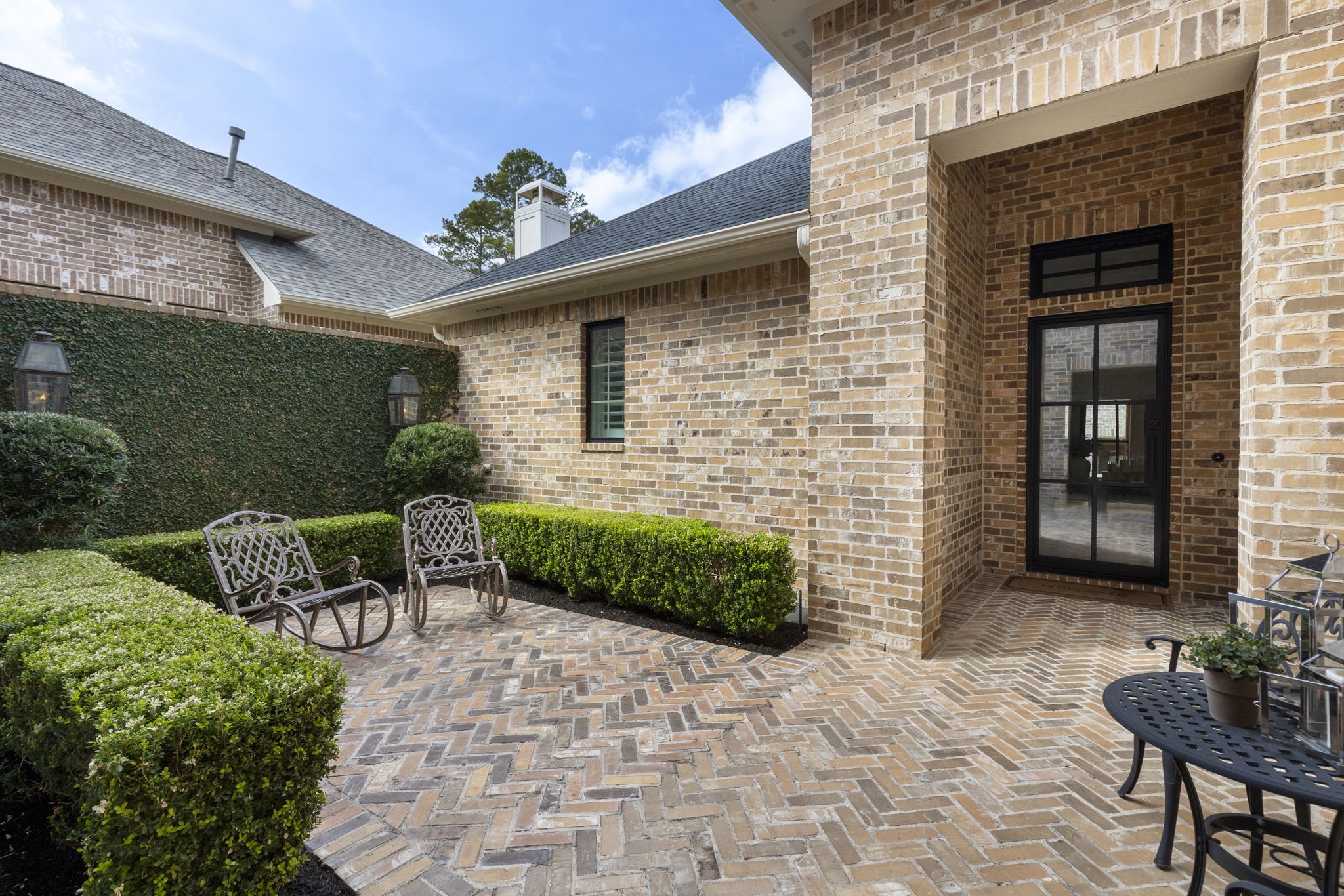 70 Lake Reverie Place Tomball, TX 77375 - Photo 4 of 33 a front view of a house with garden