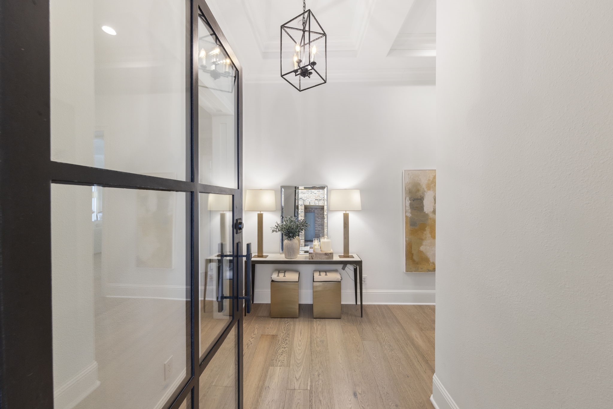 70 Lake Reverie Place Tomball, TX 77375 - Photo 6 of 33 a view of a kitchen from the hallway