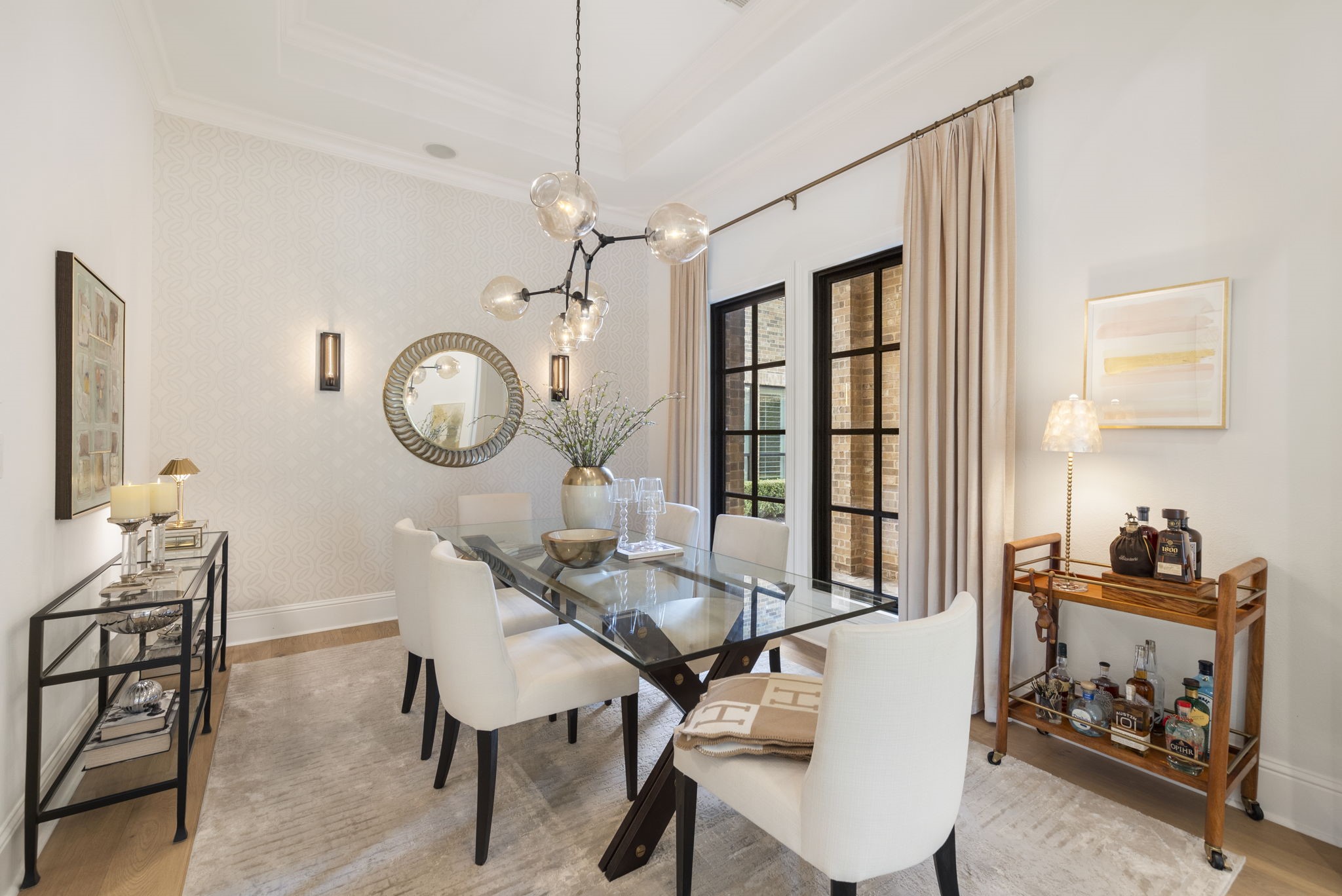 70 Lake Reverie Place Tomball, TX 77375 - Photo 7 of 33 a view of a dining room with furniture a chandelier and wooden floor