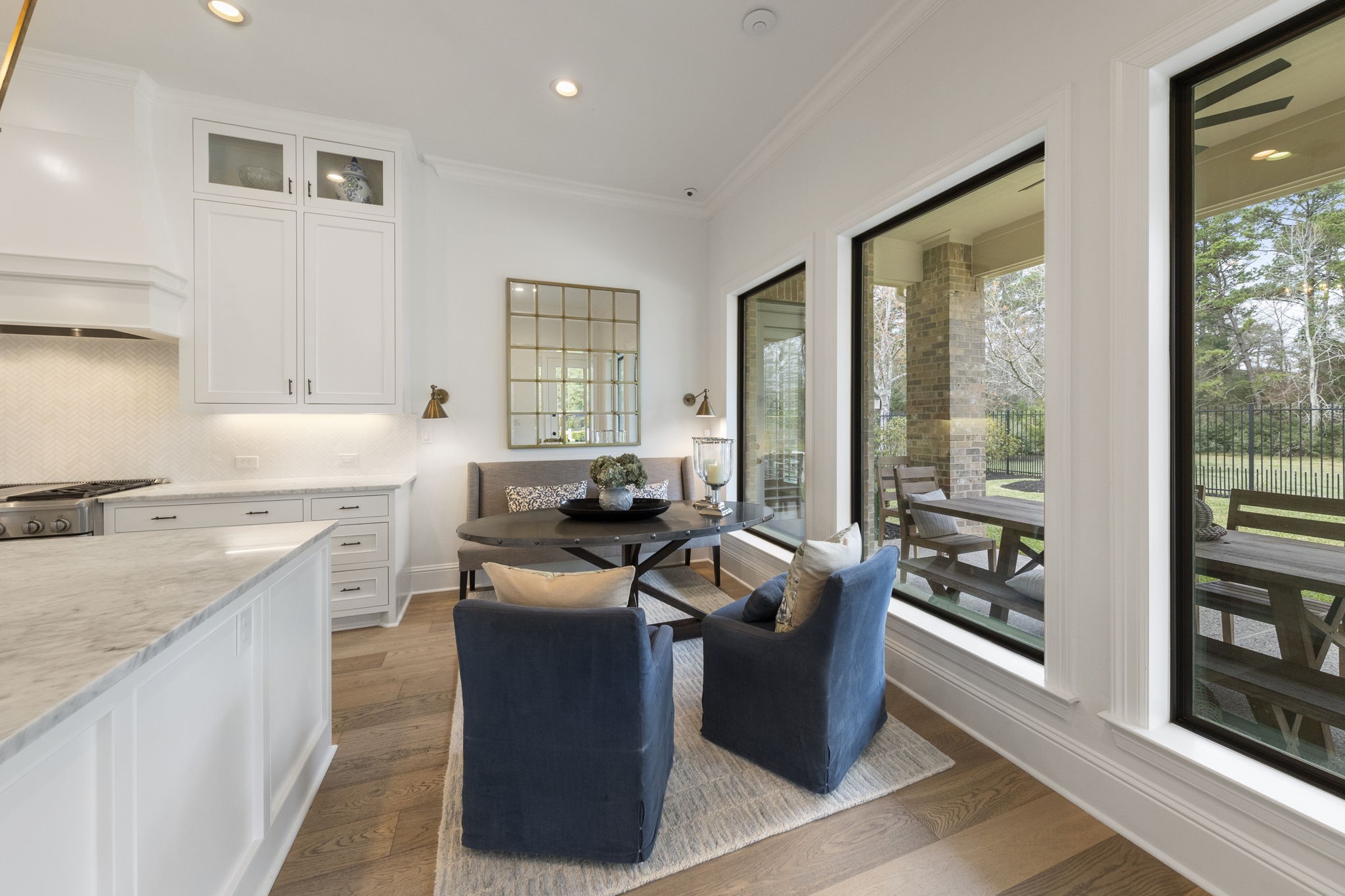 70 Lake Reverie Place Tomball, TX 77375 - Photo 10 of 33 a kitchen with stainless steel appliances granite countertop a stove a sink and a refrigerator