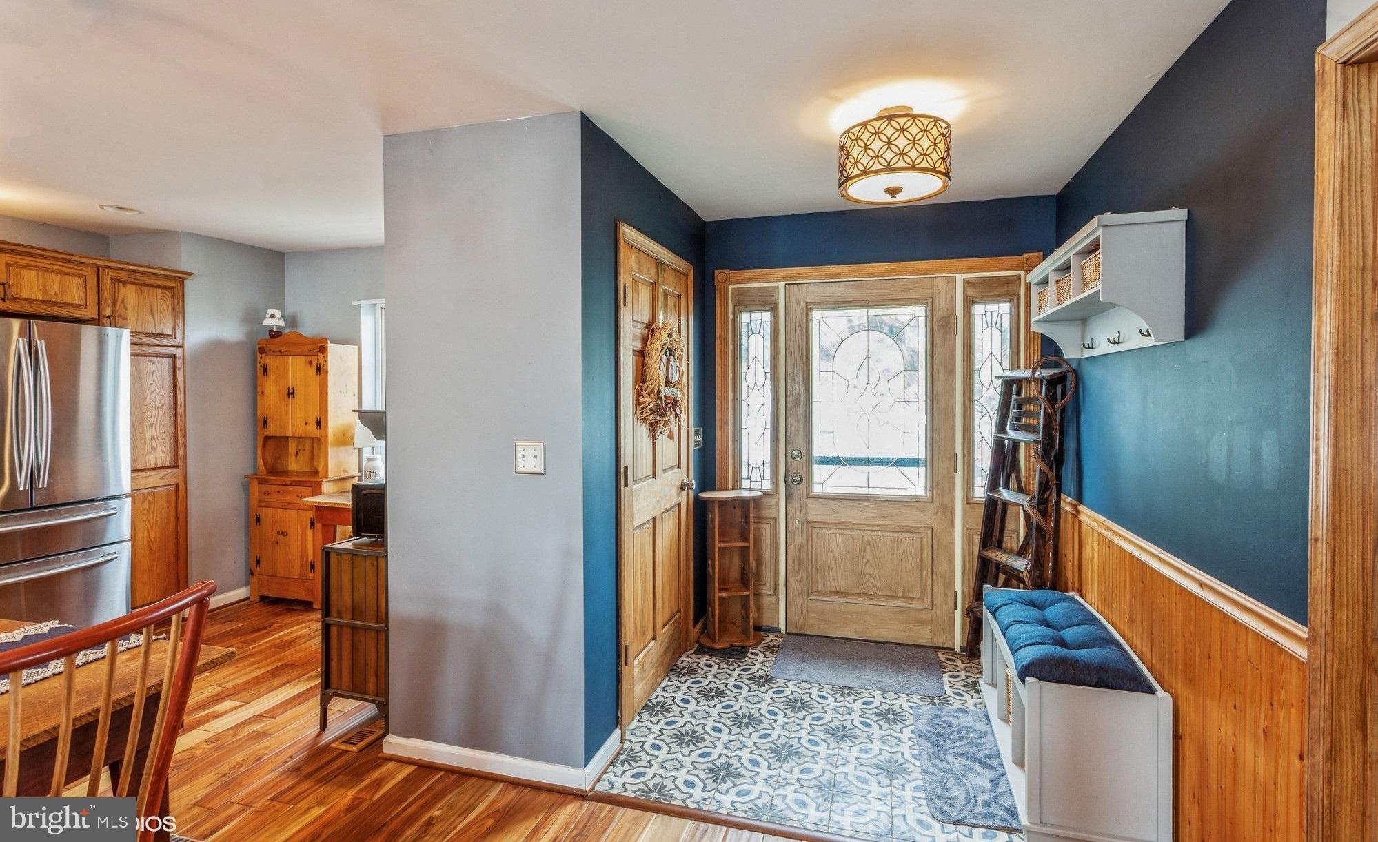 2425 Golupski Road Essex, MD 21221 - Photo 4 of 48 a view of entryway with wooden floor