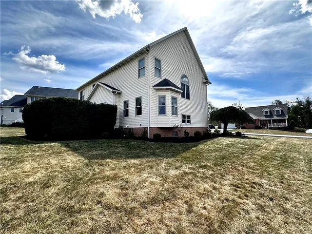 a house view with a garden space