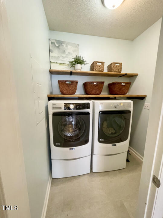 107 Legacy Lane Durham, NC 27713 - Photo 20 of 23 a utility room with dryer and washer