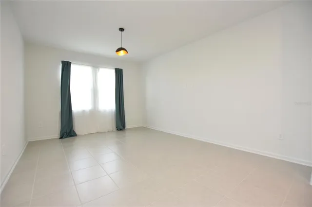 a view of a room with a window