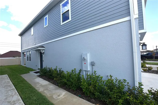 a backyard of a house with lots of green space