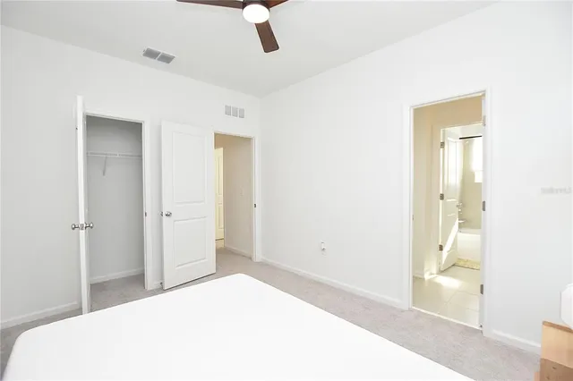 a view of a swimming pool with a chair