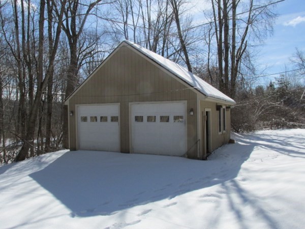 779 Town Farm Road Warren, MA 01083 - Photo 6 of 15 a front view of house with yard and trees around