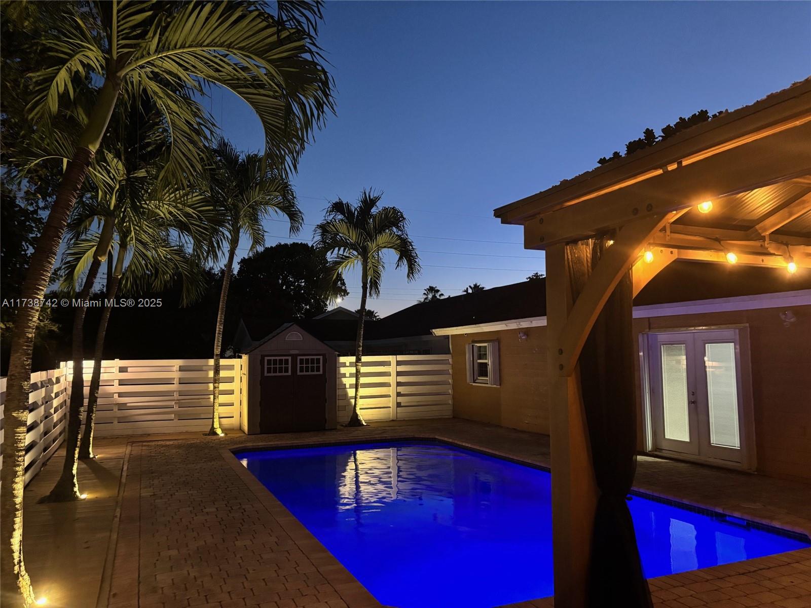 15023 Southwest 139th Place Miami, FL 33186 - Photo 4 of 31 a view of a house with a street