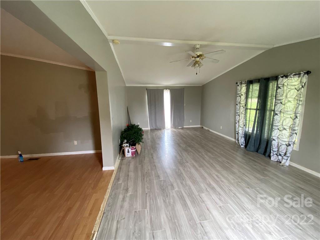 162 Ivester Road Lawndale, NC 28090 - Photo 9 of 16 wooden floor in an empty room with a window