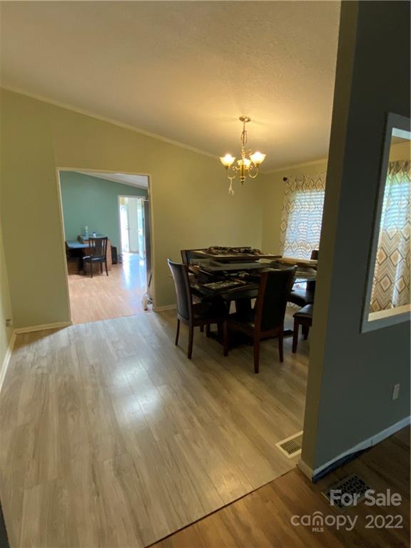 162 Ivester Road Lawndale, NC 28090 - Photo 10 of 16 a room with furniture and a chandelier