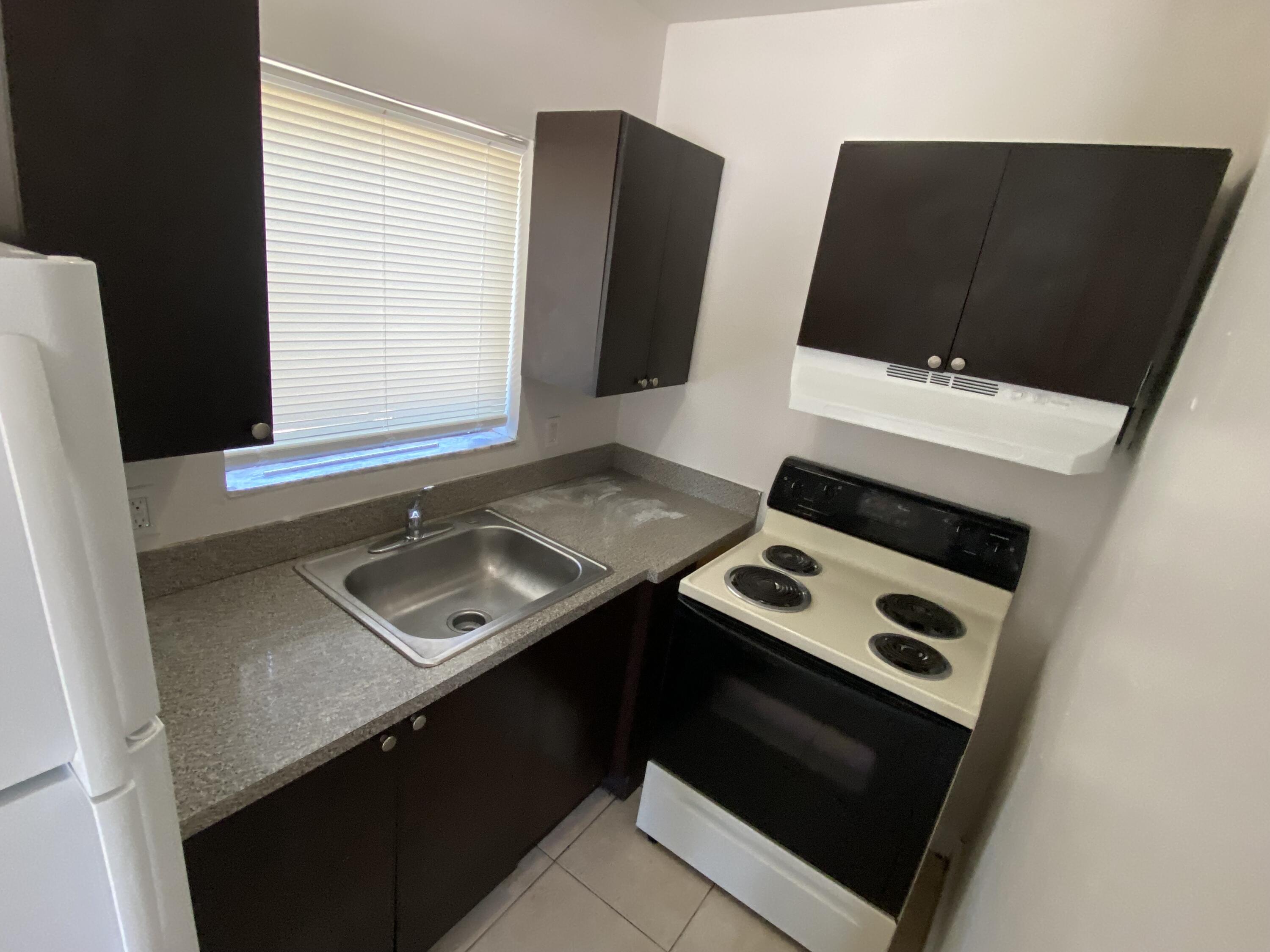 1257 West 35th Street Riviera Beach, FL 33404 - Photo 5 of 5 IMG_0727