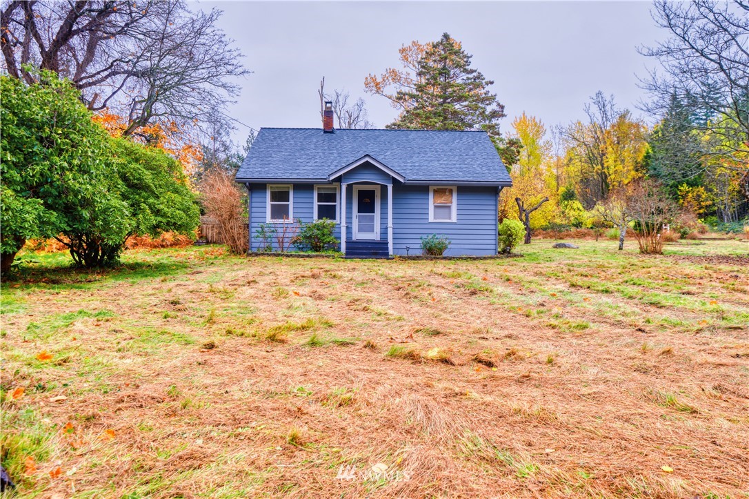 340 Boundary Bay Road Point Roberts, WA 98281 - Photo 2 of 17 a front view of a house with a yard