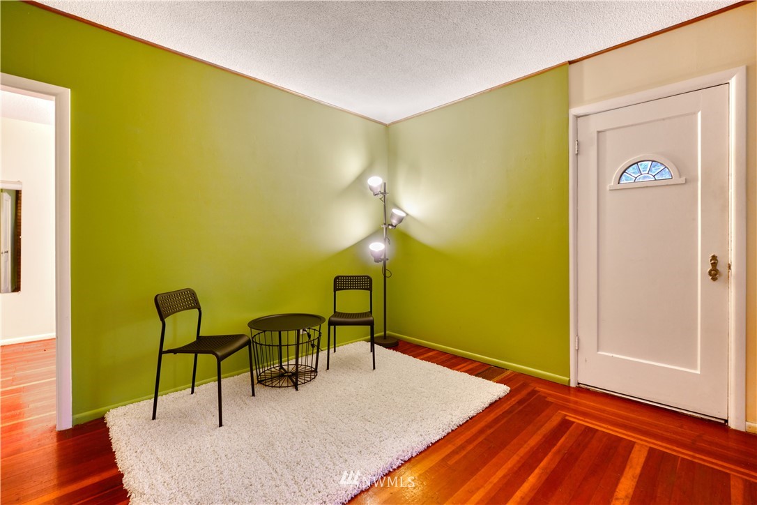 340 Boundary Bay Road Point Roberts, WA 98281 - Photo 14 of 17 a view of a room with furniture and wooden floor