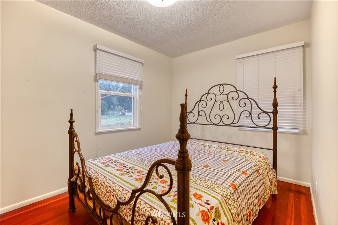 340 Boundary Bay Road Point Roberts, WA 98281 - Photo 15 of 17 a bedroom with a bed and a window