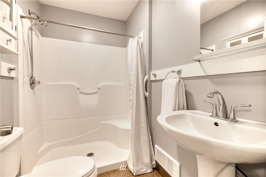 340 Boundary Bay Road Point Roberts, WA 98281 - Photo 9 of 17 a bathroom with a sink and a bathtub