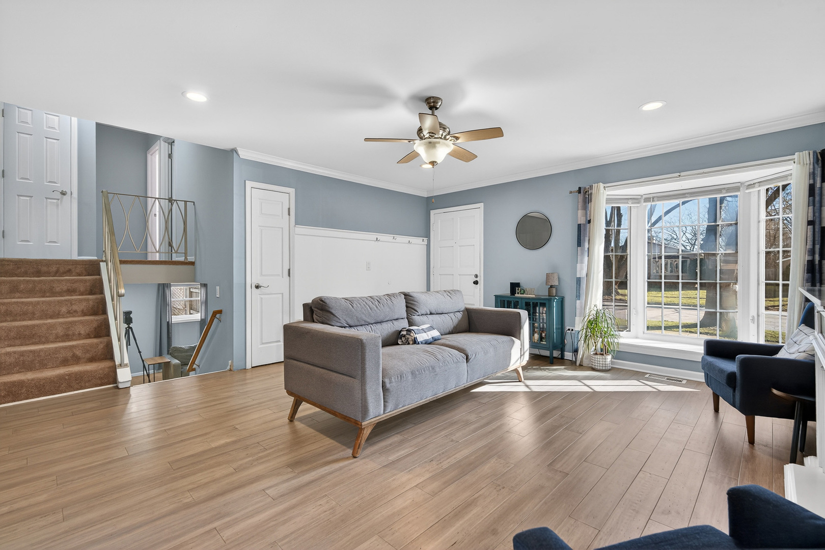 14 Devonshire Circle Elgin, IL 60123 - Photo 2 of 21 a living room with furniture and a large window