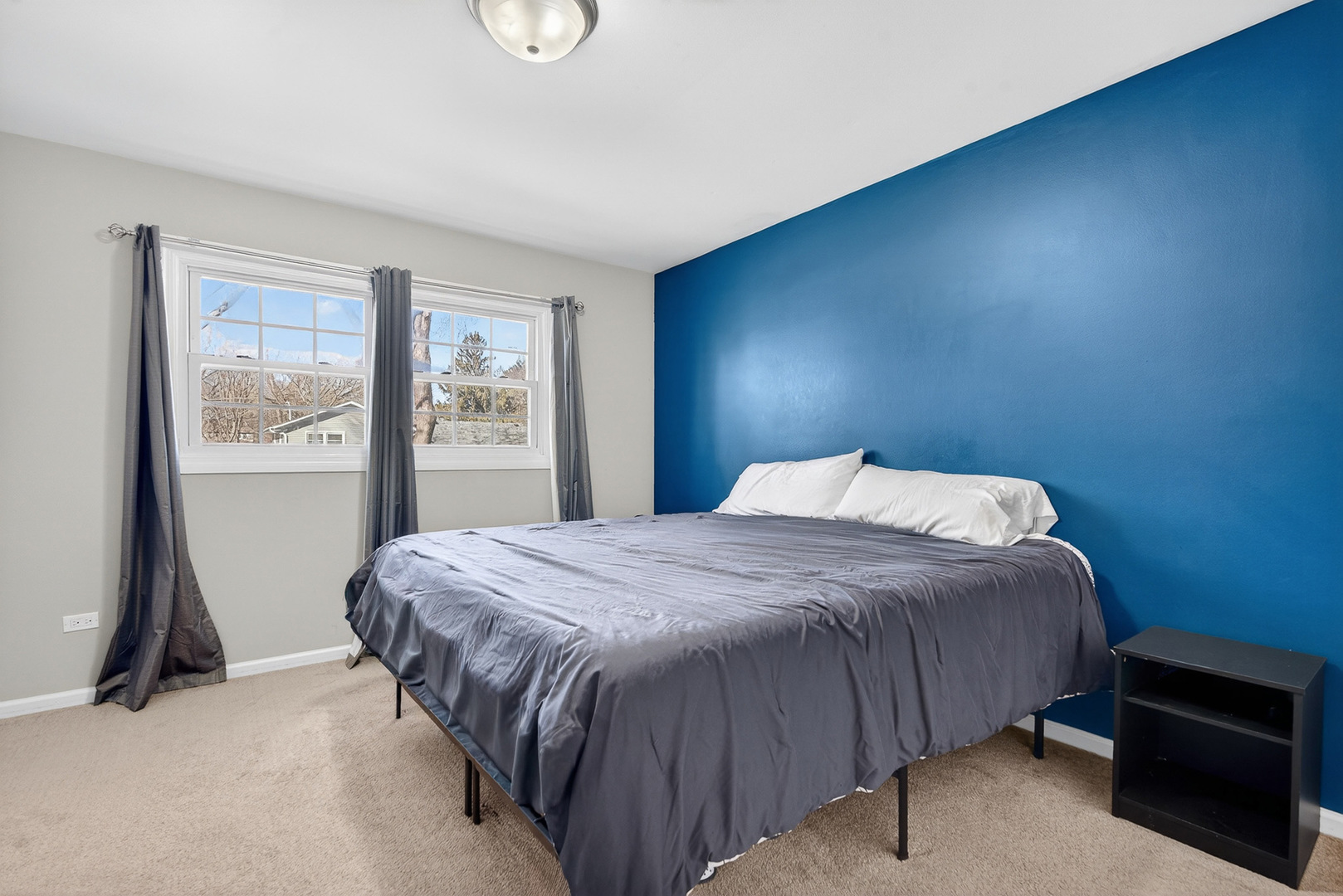 14 Devonshire Circle Elgin, IL 60123 - Photo 9 of 21 a bedroom with a bed and a night stand