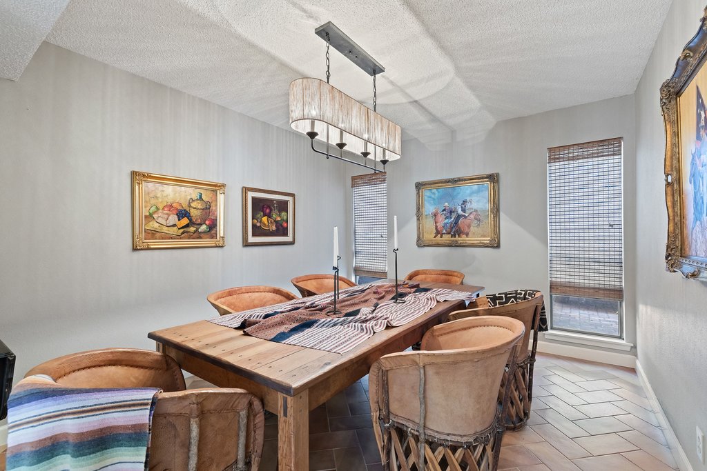 3500 Enfield Road, Unit E Austin, TX 78703 - Photo 14 of 40 Bespoke design meets organic texture with woven shades that filter the light beautifully.