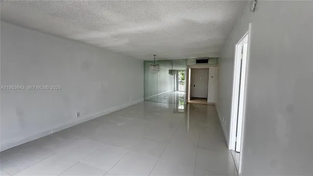 an empty room with a natural light