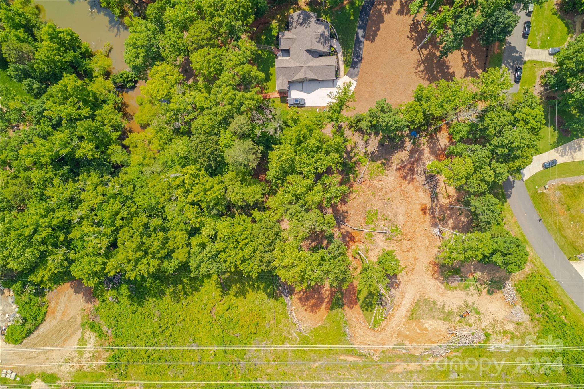 345 Squirrel Lane Clover, SC 29710 - Photo 3 of 21 a backyard of a house with lots of green space