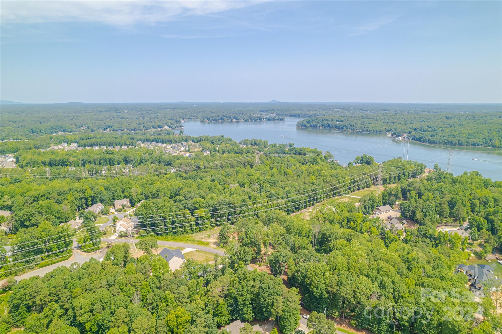 345 Squirrel Lane Clover, SC 29710 - Photo 9 of 21 a view of a lake with houses