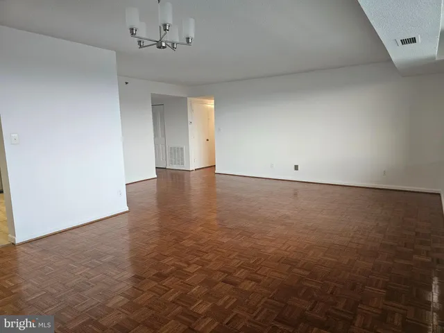 a view of a room with an empty room