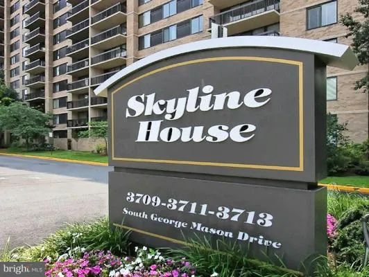 a room with lots of potted plants