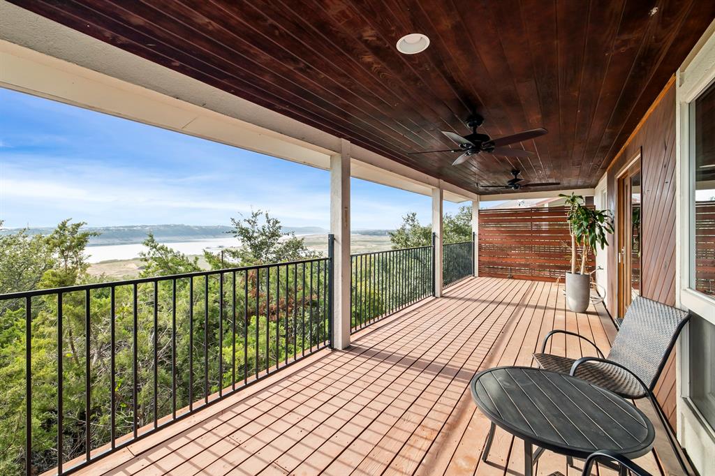 3160 Thurman Road, Unit A Lago Vista, TX 78645 - Photo 1 of 30 a view of a balcony with furniture