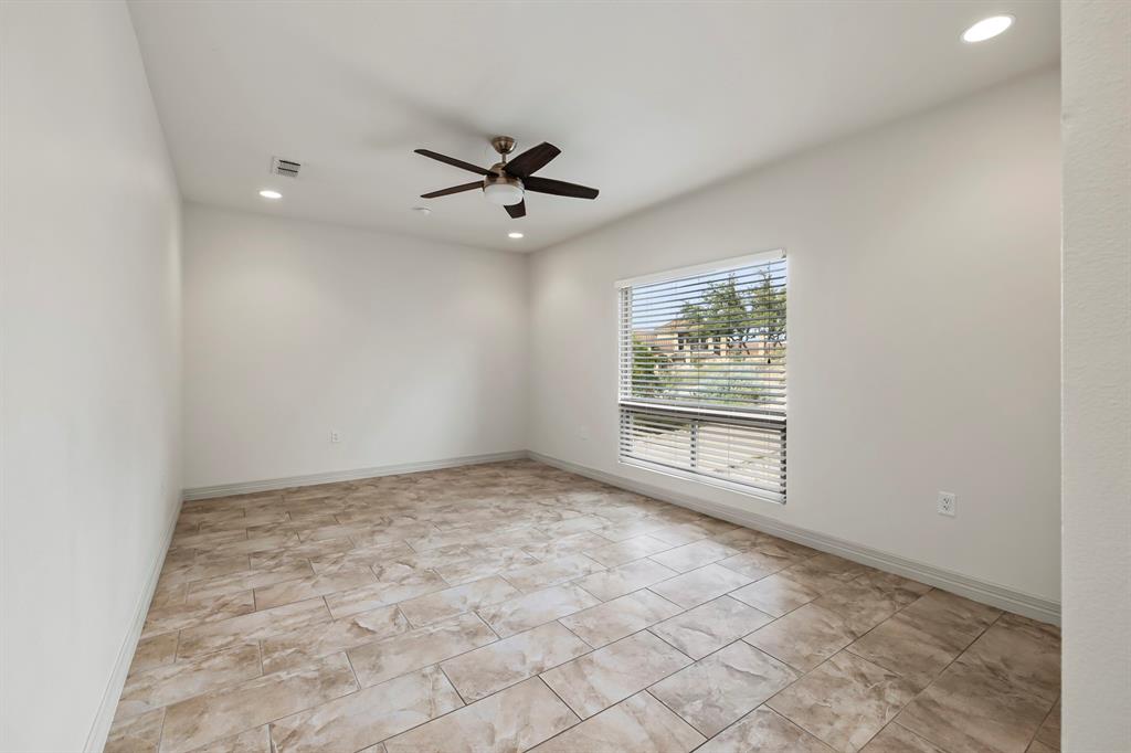 3160 Thurman Road, Unit A Lago Vista, TX 78645 - Photo 22 of 30 a view of empty room with ceiling fan