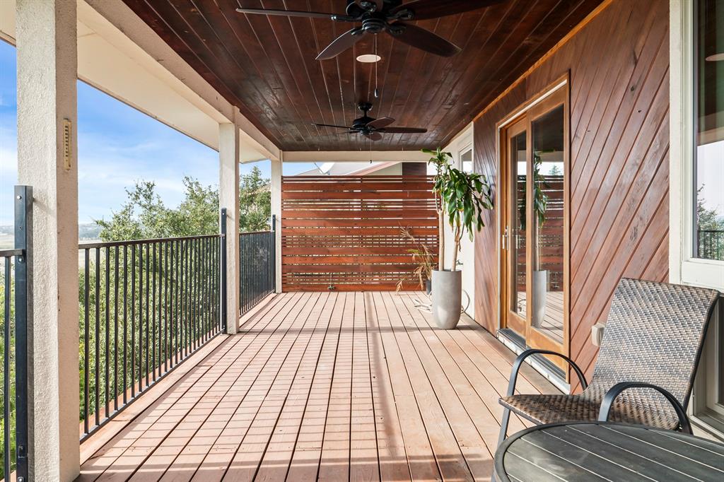 3160 Thurman Road, Unit A Lago Vista, TX 78645 - Photo 28 of 30 a view of balcony with wooden floor
