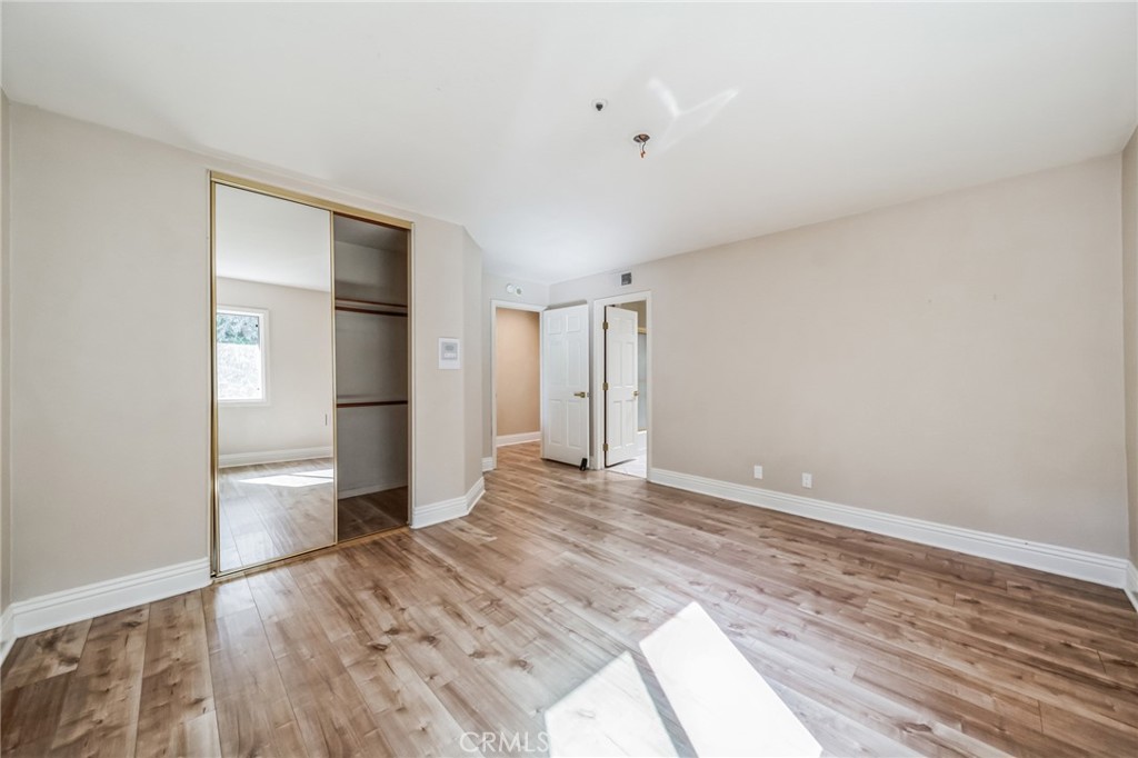 1432 Rutherford Drive Pasadena, CA 91103 - Photo 11 of 33 a view of empty room with wooden floor