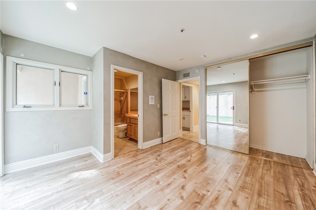 1432 Rutherford Drive Pasadena, CA 91103 - Photo 17 of 33 a view of empty room with wooden floor and cabinet