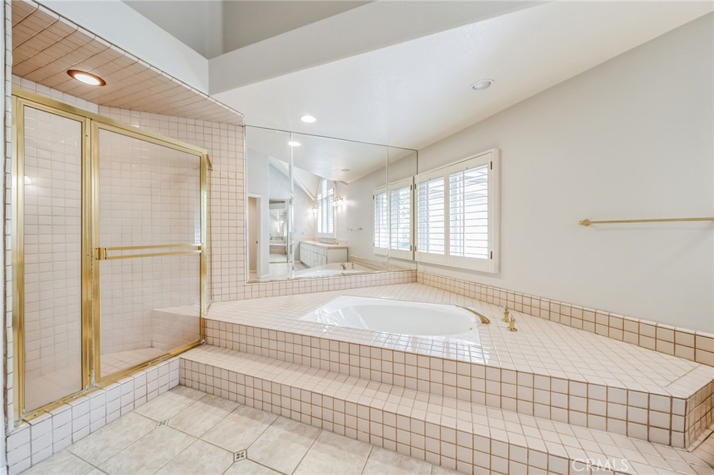 1432 Rutherford Drive Pasadena, CA 91103 - Photo 26 of 33 a bathroom with a bathtub and a shower